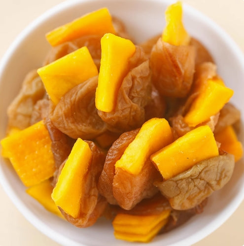 Plum - stuffed Mango Dried Fruit: Each piece is plump and thick - cut. It offers a refreshingly sour - sweet taste, bursts with fruit aroma, and has a unique flavor. Individually wrapped for easy carrying. 100g/bag